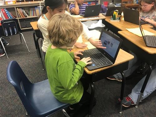 Students working on a Chromebook 