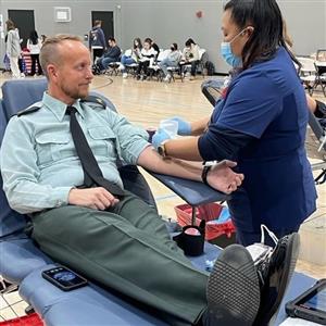 Mr. Watkins giving blood