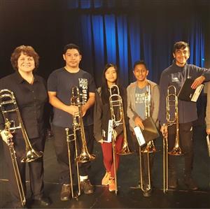 Picture of trumpet players with their instruments. 